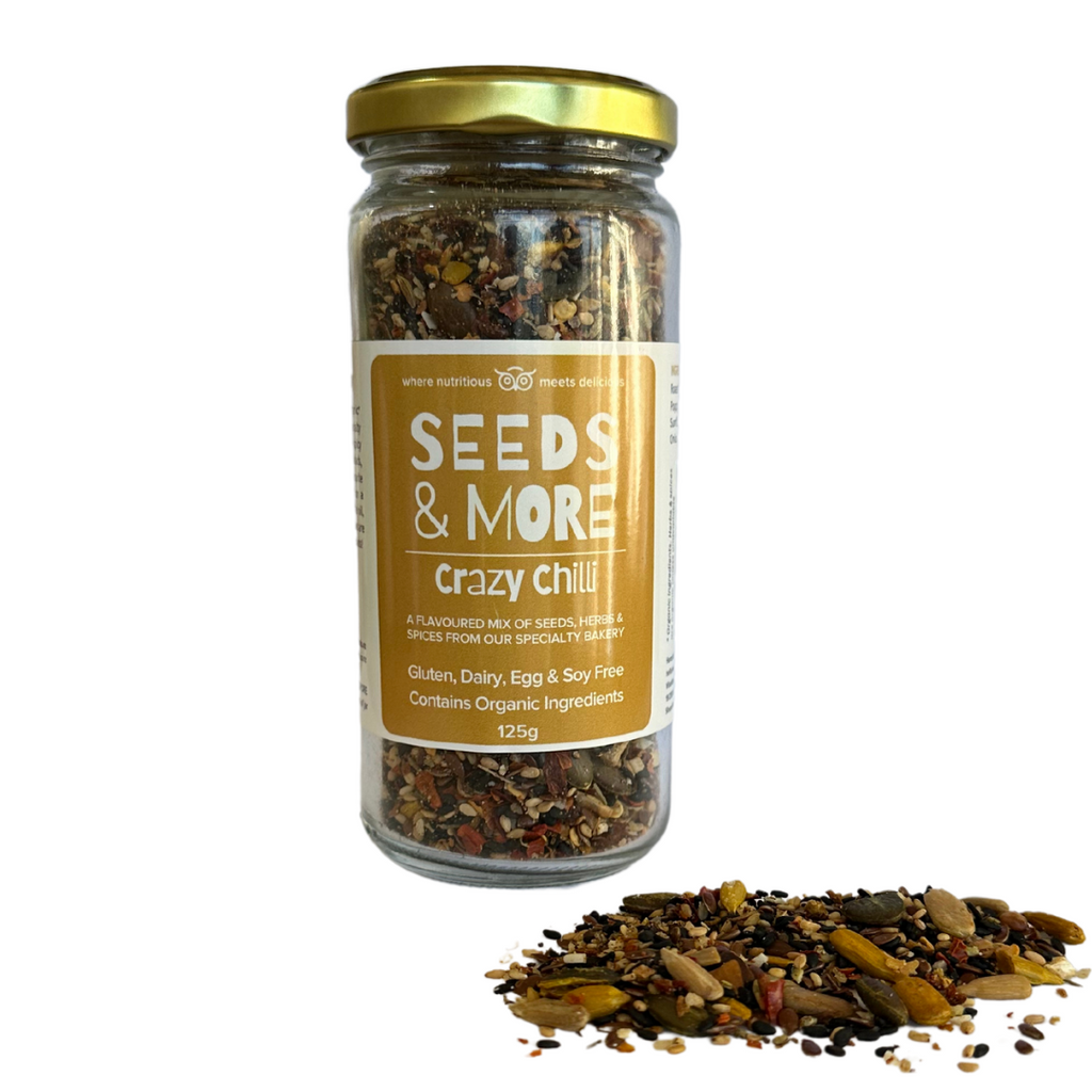 Wisefoods | Seeds & More - Crazy Chilli - 125g Jar with seed mix sprinkled in the foreground